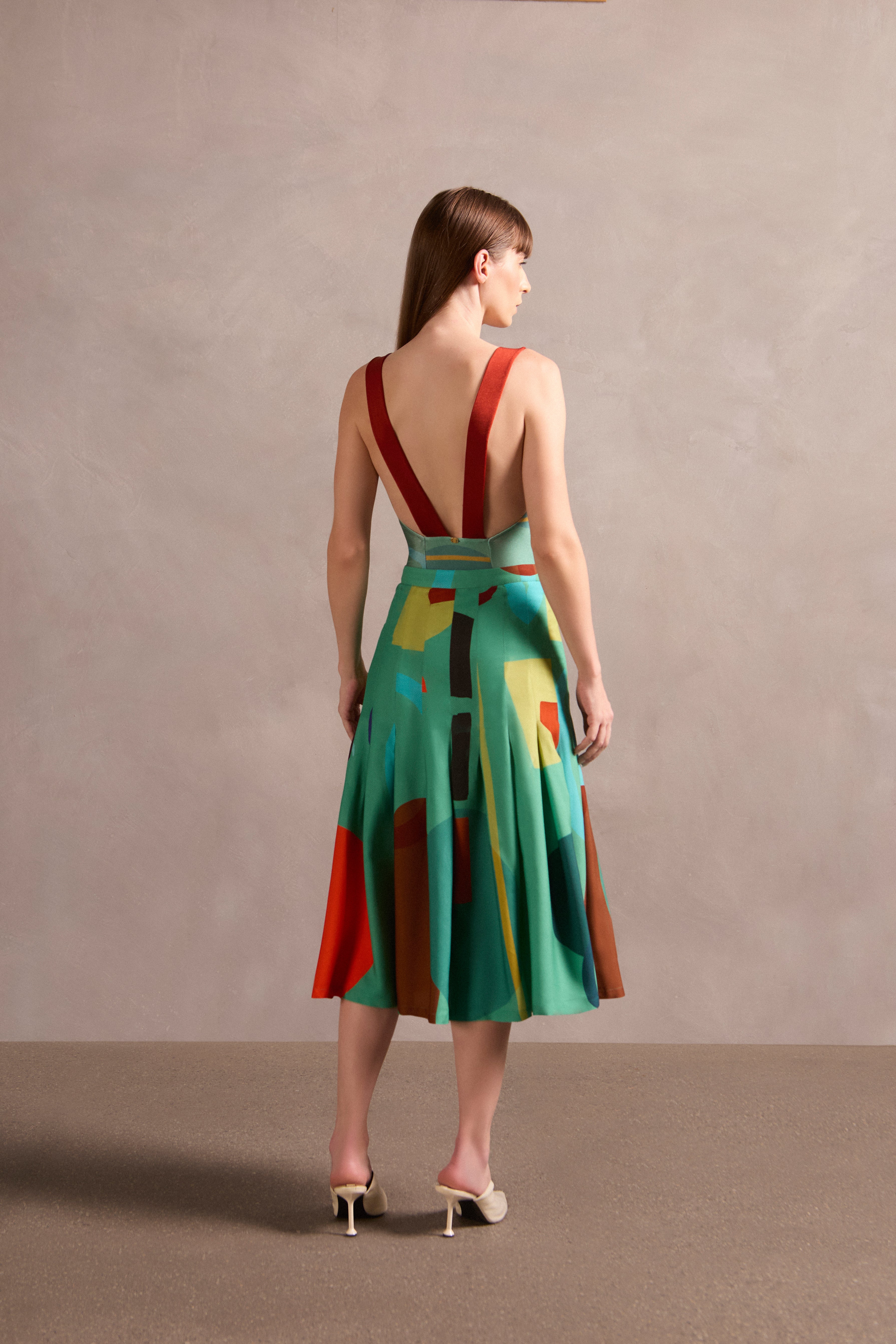 Saia Midi Pregas Modernismo