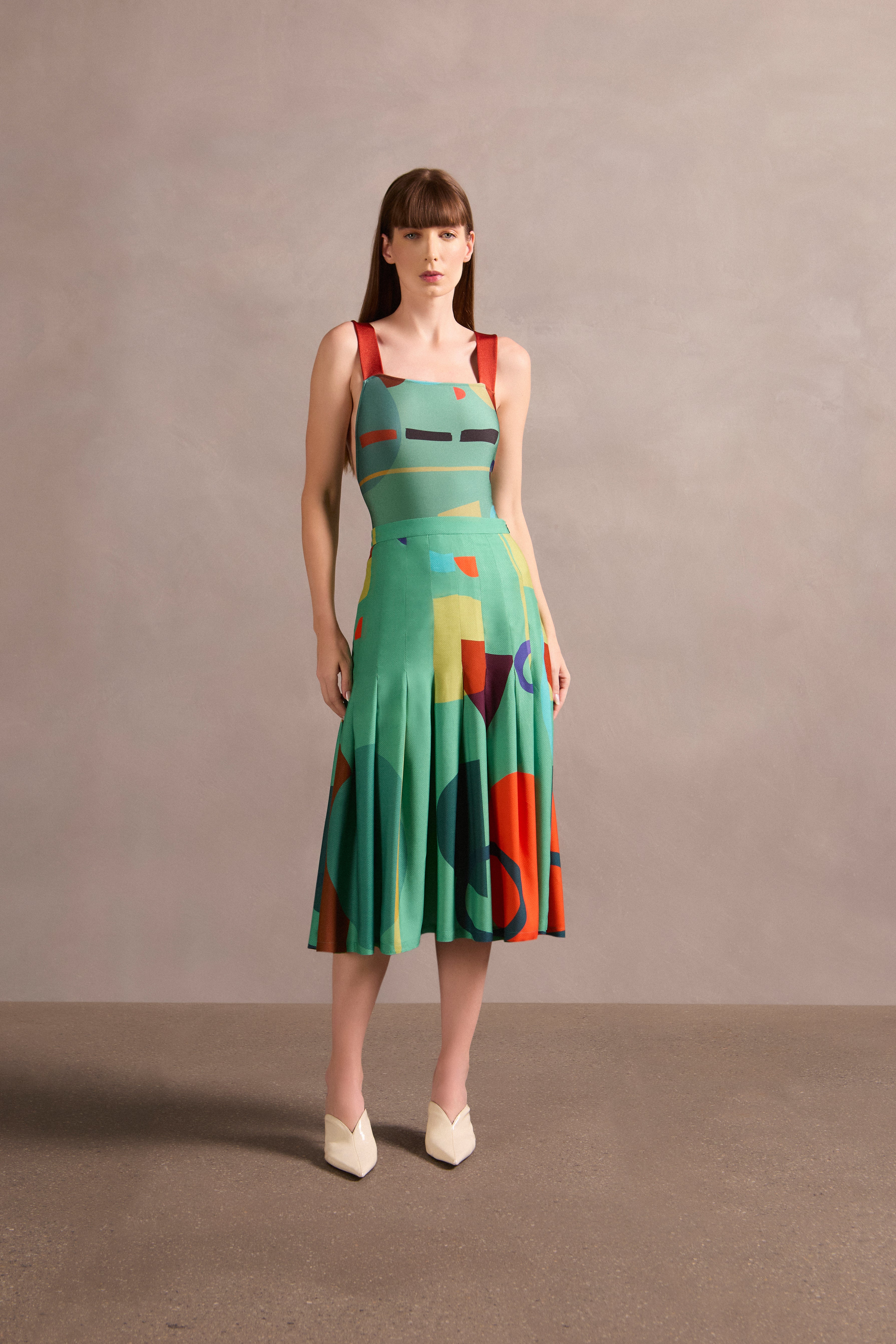 Saia Midi Pregas Modernismo