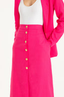 O New Vintage, estética contemporânea com inspiração retrô, código criado por Adriana Degreas está presente também nas peças de ready-to-wear das coleções. Combine esta saia longa com top estilo amarração e blazer coordenado para visual vintage chic.
